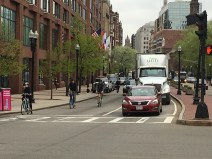 Rush-hour bike traffic takes the lane on Boylston Street, a heavily-used bike route with no dedicated bike facilities, on the morning of Friday, May 3, 2019.