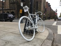A ghost bike memorializes Richard Stanley Archer, killed by a hit-and-run motorist on Commonwealth Avenue in April 2017.
