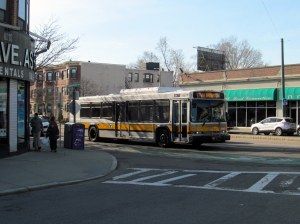 A Route 57 bus in Packard's Corner in April 2016. Wikimedia Commons photo by Pi.1415926535.