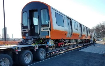 A new Orange Line car on a flatbed truck in early 2019. Courtesy of the MBTA.