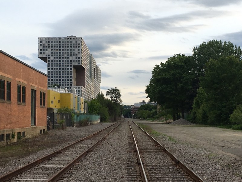 The "Grand Junction" rail line near the MIT campus photographed in June 2019. The corridor is being redesigned to include a new dedicated bike and pedestrian pathway and a possible new rapid transit line.