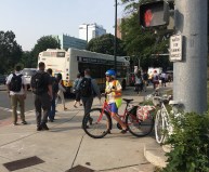 A ghost bike memorializes Paula Sharaga, the former children’s librarian at the Coolidge Corner Library, who was killed by a truck driver at the intersection of Park Drive and Brookline Avenue. The intersection, which marks the northern edge of a recent repaving project by the Department of Conservation and Recreation (DCR), features crowded sidewalks, long crosswalk wait times and inadequate bike facilities.