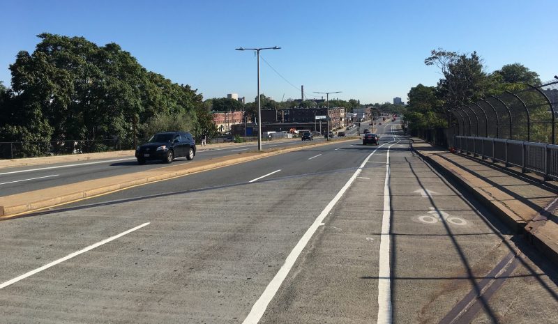The current eastbound bike lane on Cambridge Street in Allston is pictured in September 2019. The City of Boston and MassDOT are planning to add flexposts to separate the street's bike lanes from vehicular traffic.