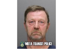 Robert Scott, 55, of Holbrook was arrested on charges of assault after allegedly driving through a crosswalk while a pedestrian was crossing, then exiting his SUV to physically assault the victim, then fleeing the scene.