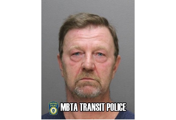 Robert Scott, 55, of Holbrook was arrested on charges of assault after allegedly driving through a crosswalk while a pedestrian was crossing, then exiting his SUV to physically assault the victim, then fleeing the scene.