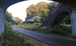 The Wayside Trail, part of the Massachusetts Central Rail Trail, passes an abandoned trail station at the Church Street underpass in Weston.