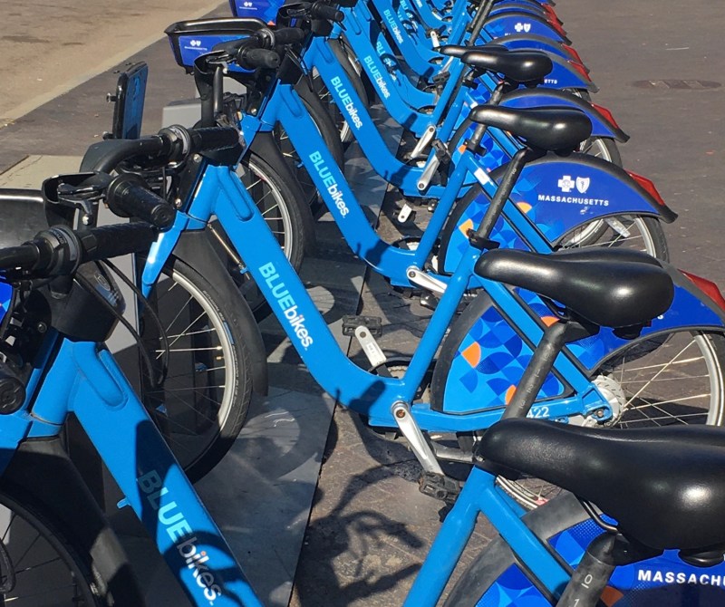 Bluebikes docked at South Station in downtown Boston.