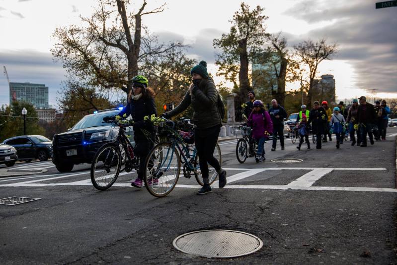 Participants in the 2018 World Day of Remembrance march up Beacon Street towards the State House. Photo by Andy Robinson, courtesy of the LivableStreets Alliance.