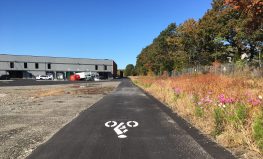 A recently-paved section of the Dedham Heritage Rail Trail in the City of Boston, pictured in October 2019. Across the town line in Dedham, advocates are still waiting for town leaders to move forward with a long-planned greenway that would link downtown Dedham to the Readville commuter rail station in Boston.