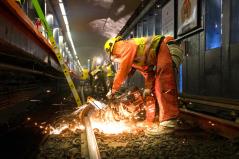 MBTA workers replace rail inside the Haymarket Orange Line station in 2020. Courtesy of the MBTA.