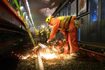 MBTA workers replace rail inside the Haymarket Orange Line station in 2020. Courtesy of the MBTA.