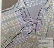 A map illustrates one of 11 design options under analysis for the "Connect Downtown" project to improve bike and pedestrian connections into and across downtown Boston. Option 1-A would create a separated bike facilities running counter-clockwise around the Public Garden, and a new southbound protected bike lane on Tremont Street downtown. Map courtesy of the City of Boston; photo by Elena Huisman.