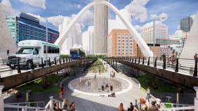 A photo illustration of what a new Northern Avenue Bridge would look like with a dedicated lane for privately-operated shuttles. Photo montage by StreetsblogMASS, based on bridge renderings from the City of Boston.