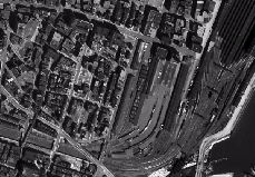Aerial imagery of Boston's Chinatown neighborhood in 1952, before urban renewal, and in 1969, after the construction of the Central Artery. Imagery by USGS, courtesy of MapJunction.com