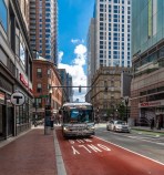 An SL5 bus stops in a new dedicated bus lane on Washington Street near the Chinatown  T station. Courtesy of the MTBA.