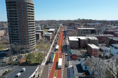 A rendering of a proposed center-running bus transitway for Columbus Avenue. The project would extend from the Jackson Square Orange Line station, through Egleston Square (pictured) to Franklin Park, and is scheduled to go under construction this fall for completion in 2021.  Courtesy of the Boston Transportation Department.
