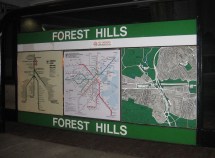 A relic Green Line sign at Forest Hills Station, pictured in 2011. The Green Line's E Branch service to Forest Hills was suspended in the 1980s and never returned. Photo courtesy of Wikimedia Commons user Pi.1415926535.