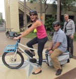 Steve Cliff, riding on the back of an ebike piloted by Jeanie Ward Waller, at the 2016 California Bike Summit. Photo: Melanie Curry/Streetsblog California