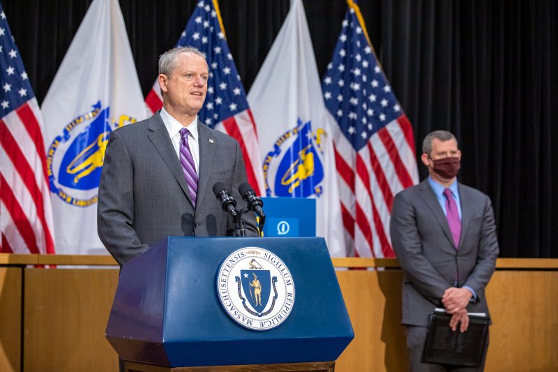 Gov. Charlie Baker (left) and MassDOT Secretary Jayme Tesler (background).