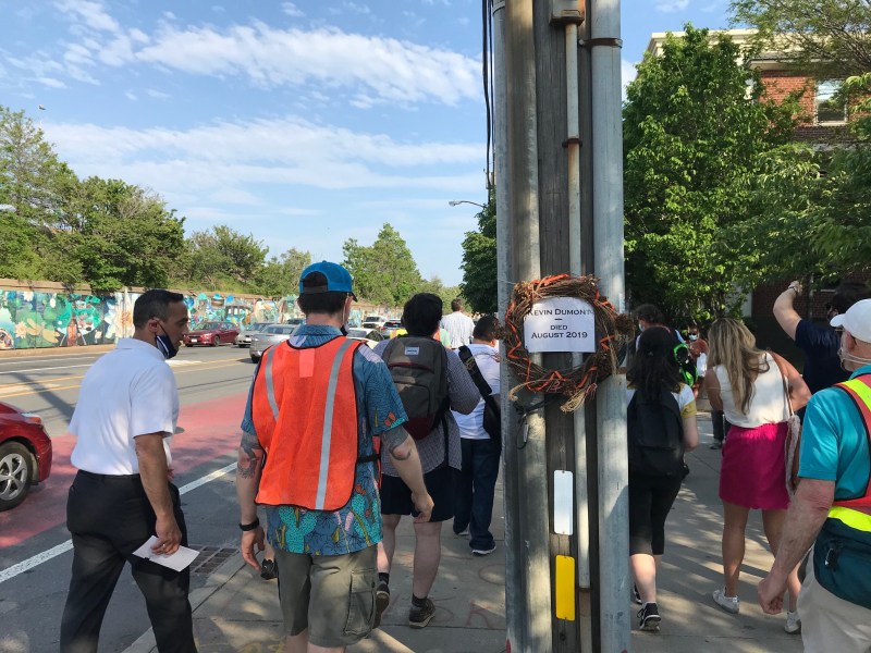 A memorial to Kevin Dumont on Mystic Avenue, near the crosswalk where a hit-and-run driver killed him in August 2019.
