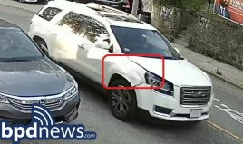 A surveillance video frame shows the white SUV that struck and seriously injured 5th grader Francis Nedwell on Wednesday in Dorchester. Courtesy of the Boston Police Department.