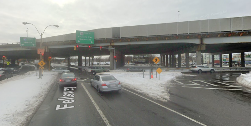 A Google Street View snapshot of the Fellsway in Somerville, showing a snowbank burying the rightmost lane at its intersection with Mystic Avenue.