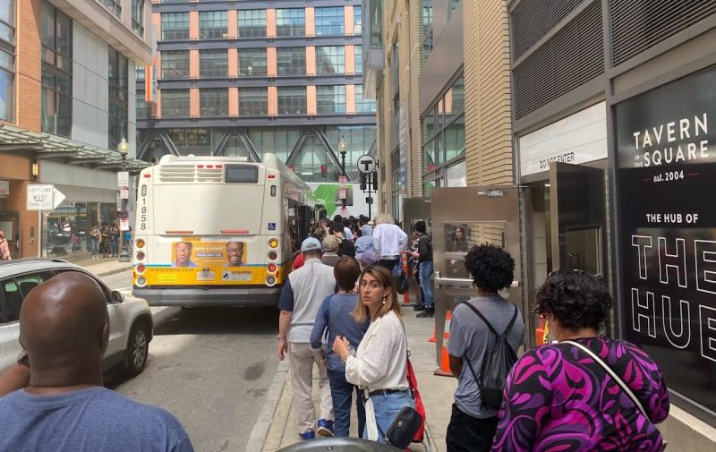 People boarding the shuttle bus outside North Station headed to Government Center.