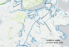 A map of Boston's current bike network and new infrastructure announced by the Wu administration on Tuesday. Bold orange lines indicate new protected bike lanes and yellow lines indicate new contraflow bike lanes on one-way streets. Dark blue lines indicate protected bike lane projects already in progress, including Tremont Street in the South End and Ruggles Street in Roxbury.